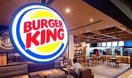 Logo do Burger King em sua loja em destaque, remetendo à compradora da Domino's