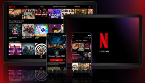 Telas de celulares e laptop abertos com espaço do Netflix games