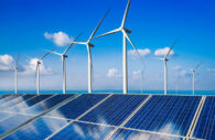 painéis solares e turbinas eólicas, alusivo à transição energética